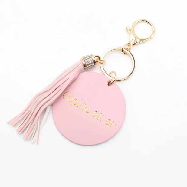Porte clefs avec message copine en or
