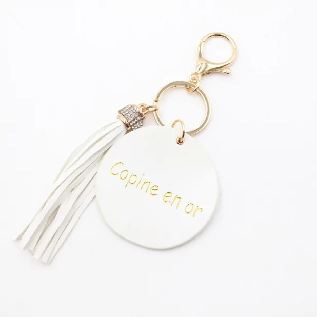 Porte clefs avec message copine en or