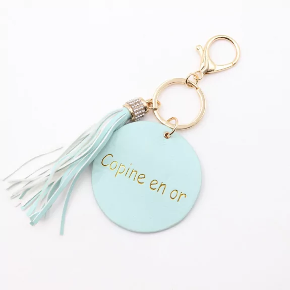 Porte clefs avec message copine en or
