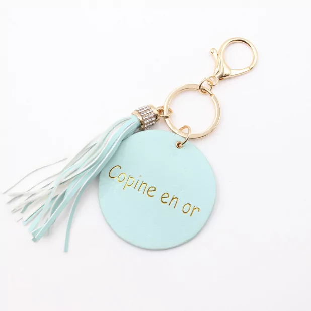 Porte clefs avec message copine en or
