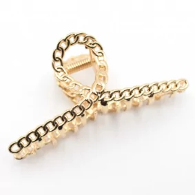 Pince à  cheveux en métal doré