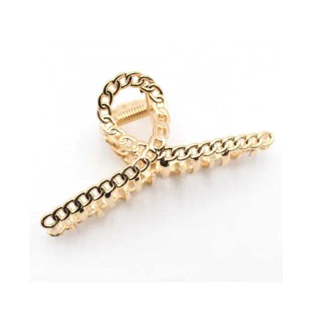 Pince à  cheveux en métal doré