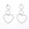 Boucle d'oreille en acier motif coeur