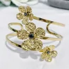 Bracelet jonc acier fleurs