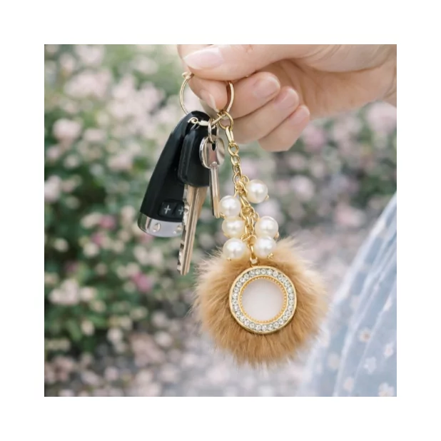 Porte clefs en acier et fausse fourrure