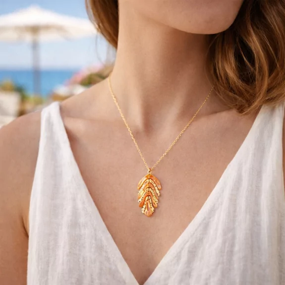 Sautoir acier avec pendentif feuille de couleur