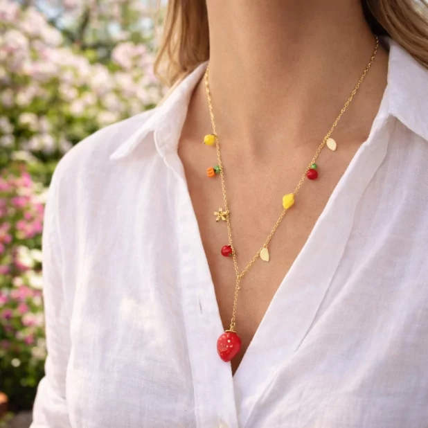 Sautoir doré breloques fruits