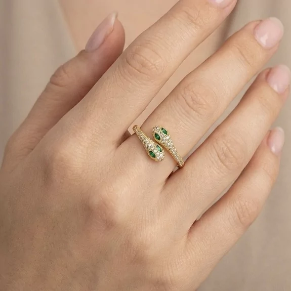 Bague serpent pavée de strass et pierres vertes